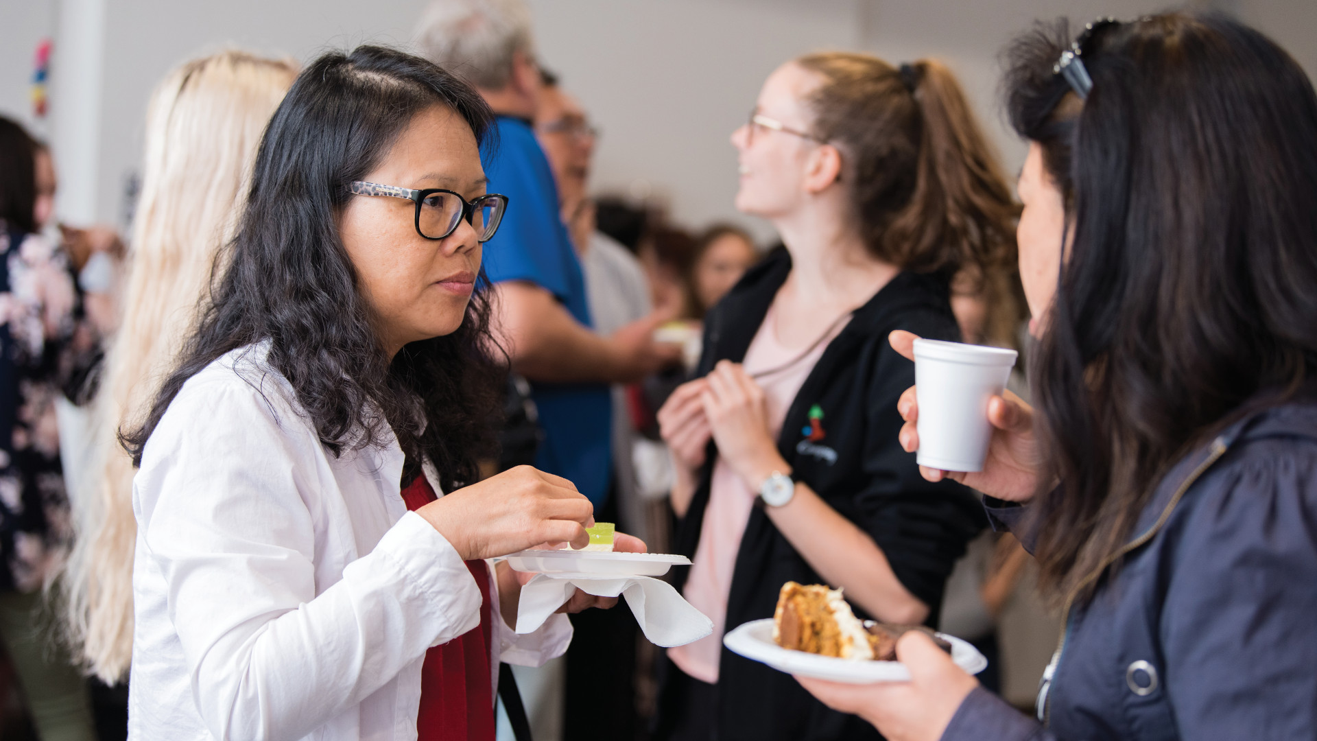 Two Asian women eating